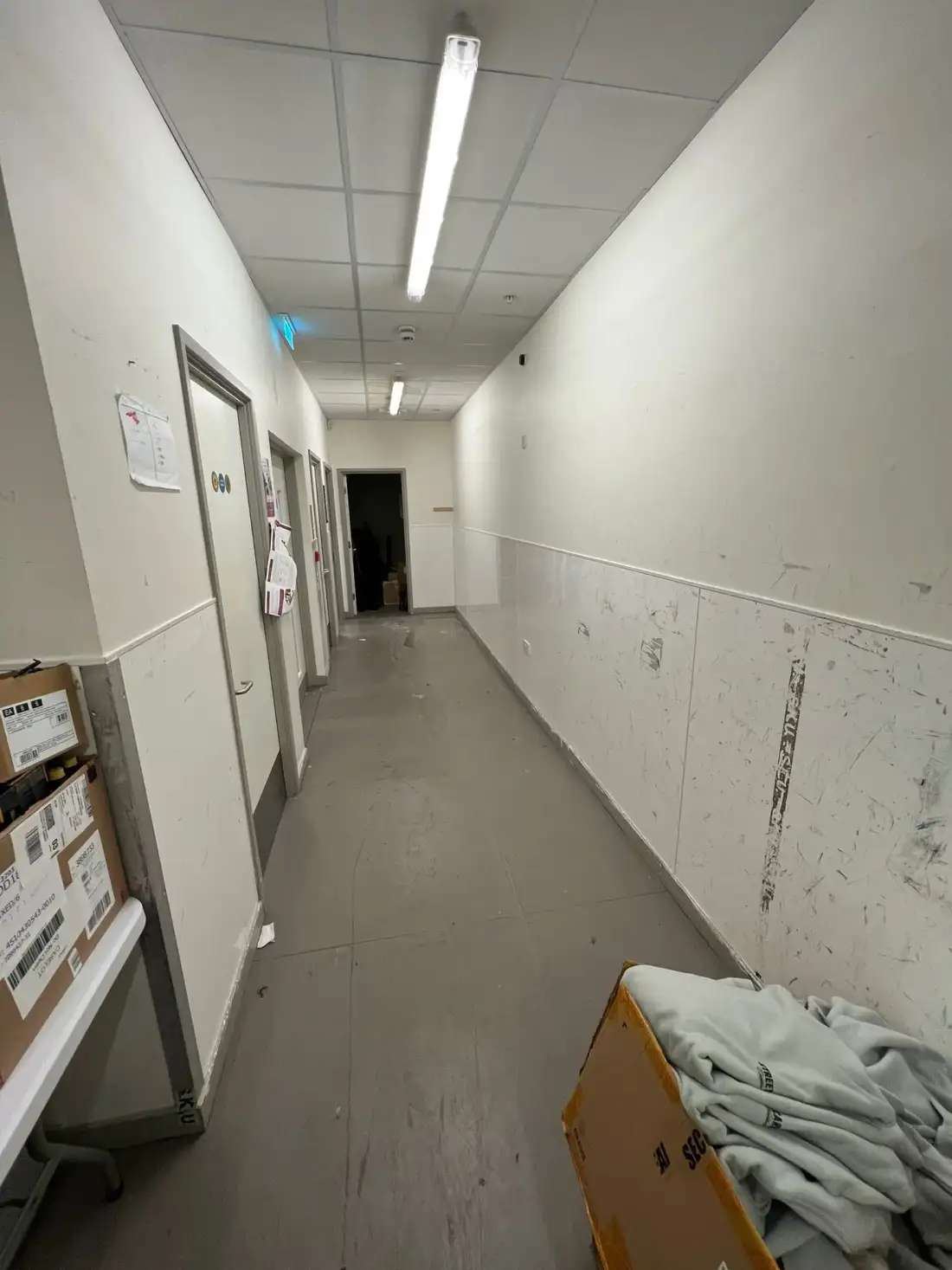 Stock room corridor with boxed items awaiting clearance